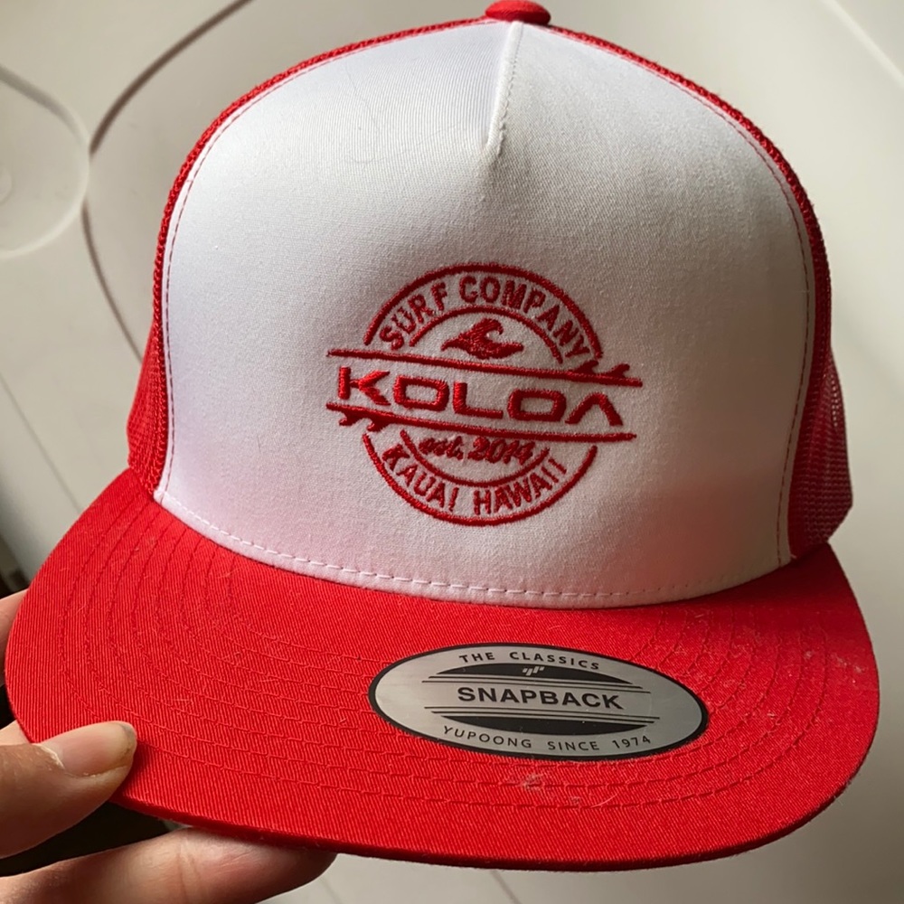 Koloa surf company.  Snap back red/white hat. New, with tags.
